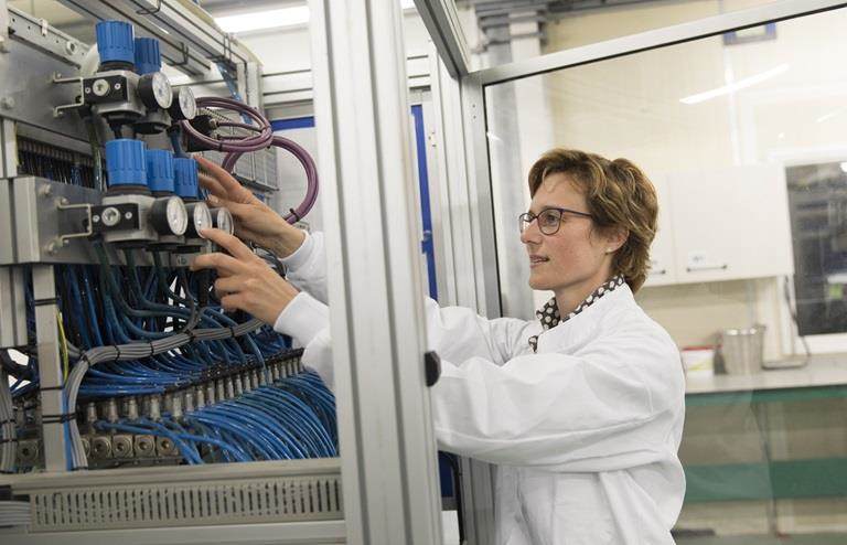 Incotec technology expert working with x-ray seed upgrading equipment
